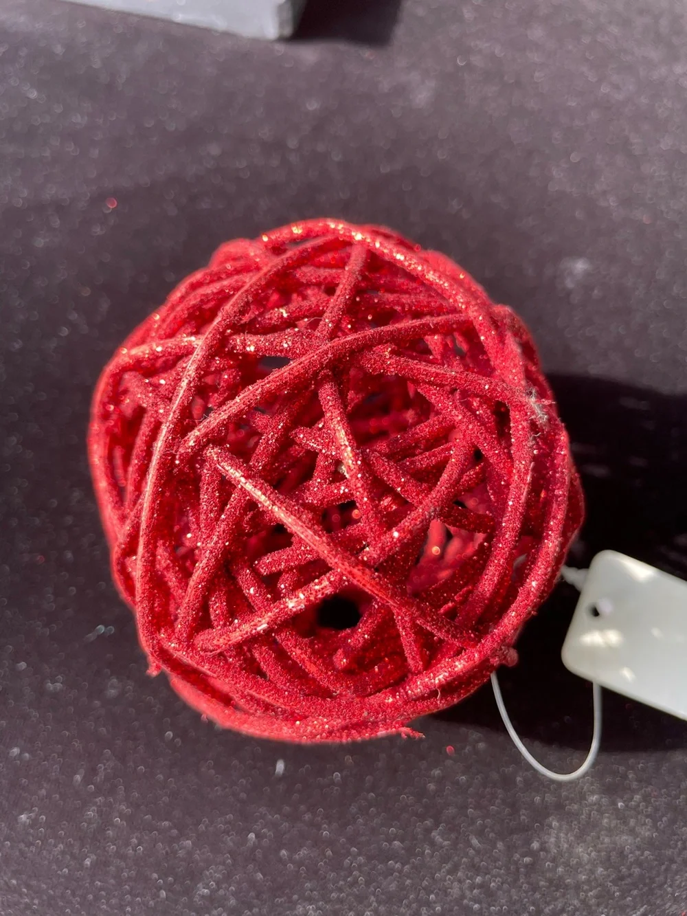 Pier 1 Nomad Weave Metal Boat Basket with Red and Silver Rattan Glitter Spheres